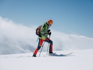 Skier on alpine mountain adventure